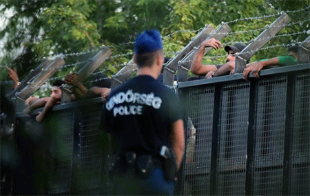 Policías y alambradas impiden entrada de refugiados a Europa